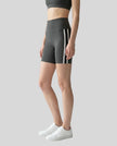 Side view of the TrackLine Sprint Shorts in gray, showcasing the athletic silhouette