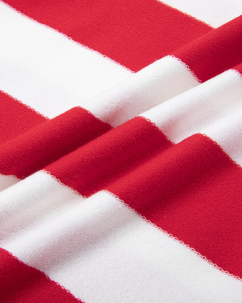 Close-up of the cotton stretch fabric on the red and white Athlesi TrackLine Striped Polo Shirt
