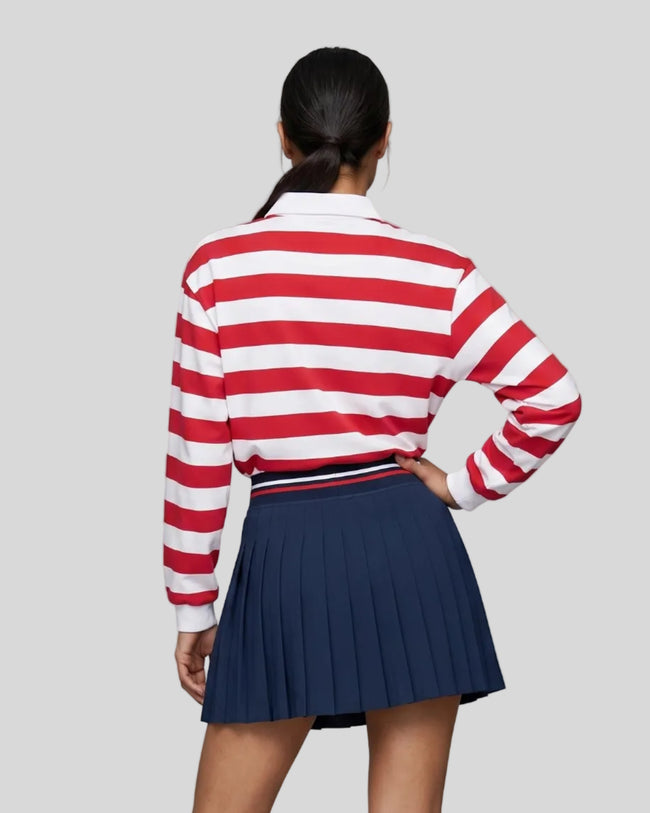 Model wearing the Athlesi TrackLine Striped Polo Shirt in red and white, back view