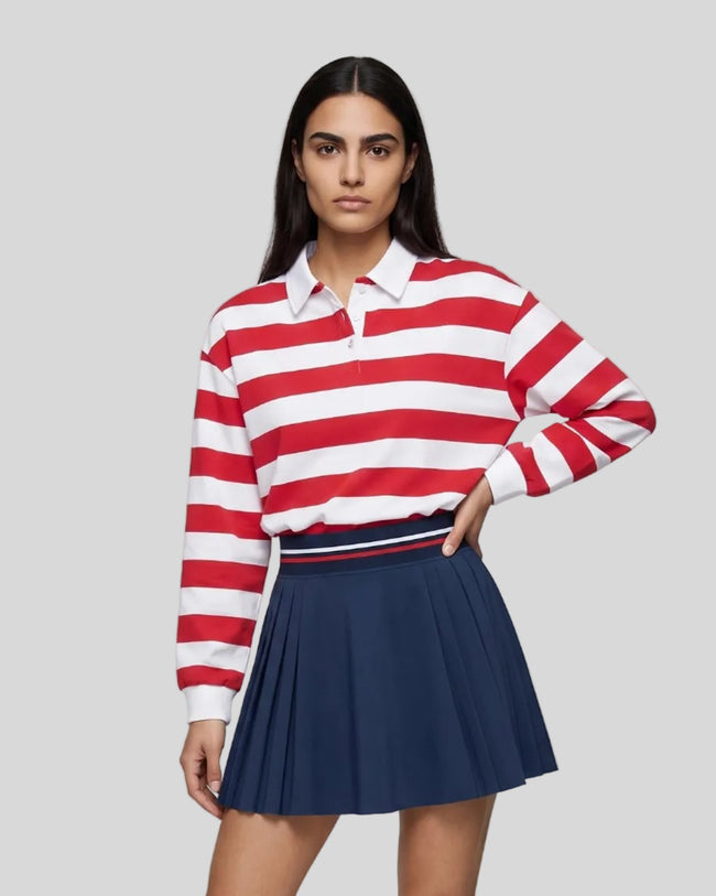 Model wearing the Athlesi TrackLine Striped Polo Shirt in red and white, front view