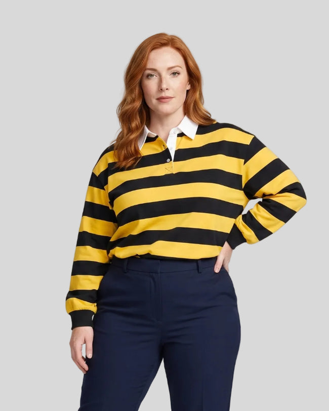 Model wearing the Athlesi TrackLine Striped Polo Shirt in yellow and navy blue, front view