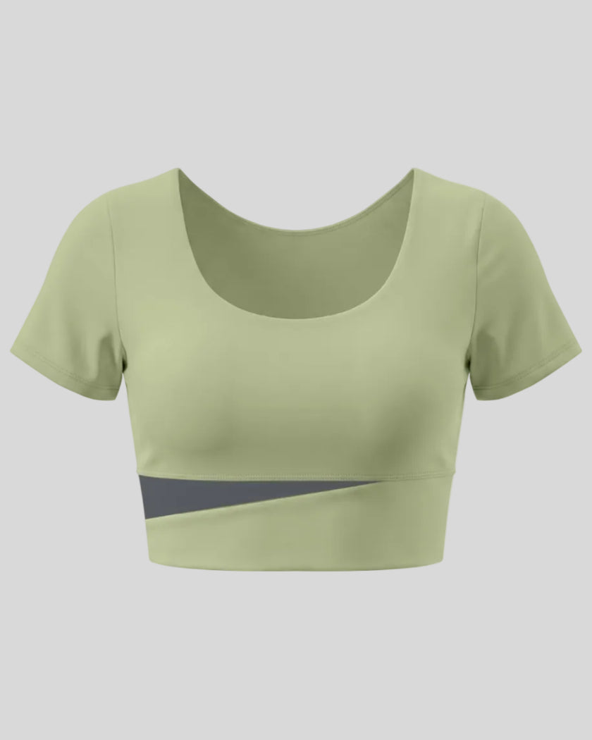 TrackLine Synergy Cropped Tee in Bean Green with Dark Gray color-block panel, 3D front view