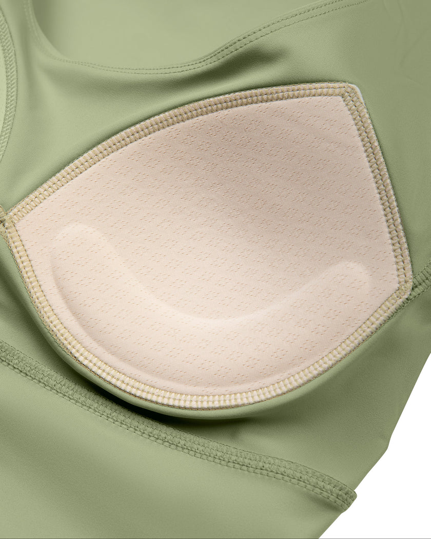 Interior chest pad detail of TrackLine Synergy Cropped Tee in Bean Green