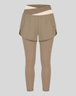 TrackLine Synergy Layered Leggings in light coffee with apricot crossover waistband and overlay shorts front view
