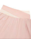 Closeup of back waistband on TrackLine Synergy Layered Leggings in light pink and apricot