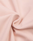 Closeup of stretch legging fabric on TrackLine Synergy Layered Leggings in light pink