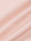 Closeup of lightweight outer shorts fabric on TrackLine Synergy Layered Leggings in light pink