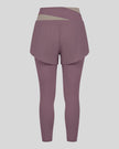 TrackLine Synergy Layered Leggings in misty purple with gray purple crossover waistband and overlay shorts back view