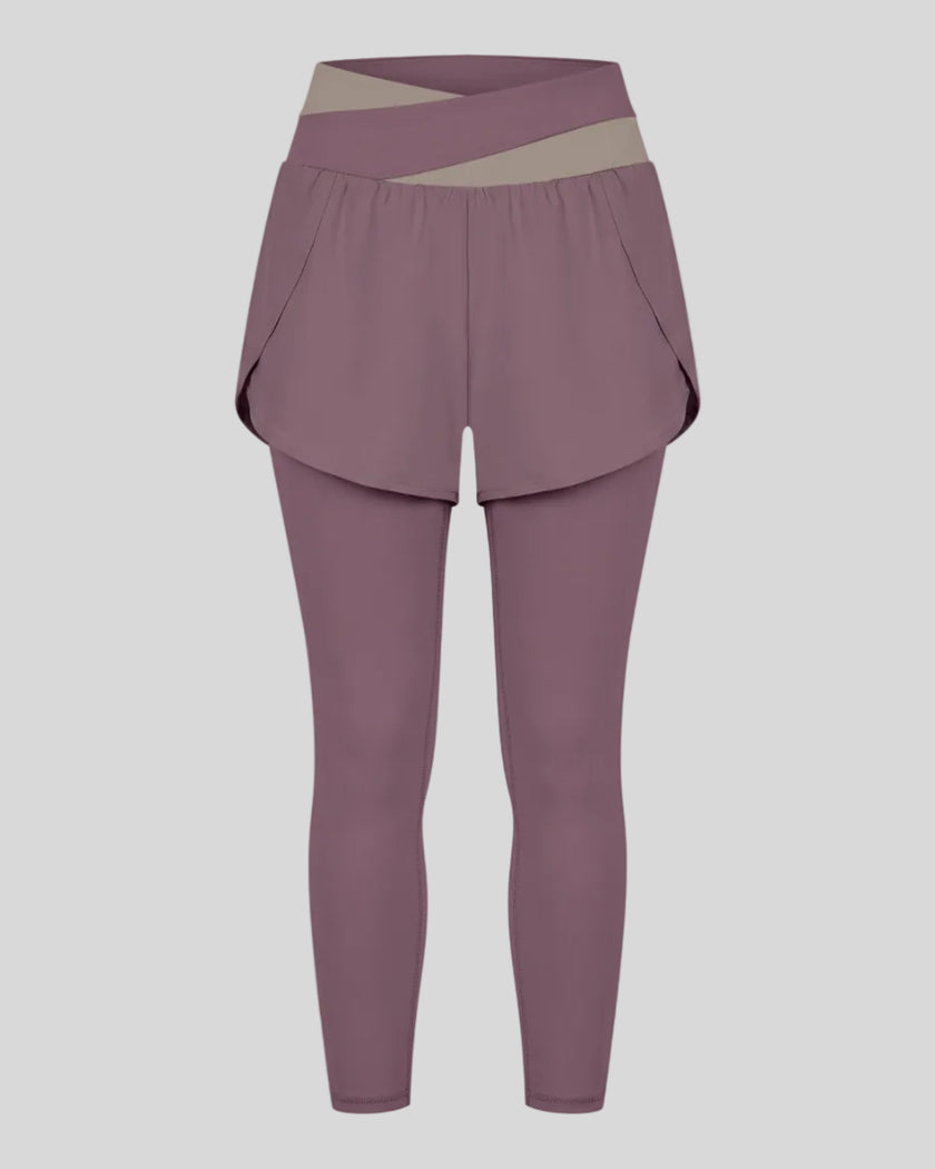 TrackLine Synergy Layered Leggings in misty purple with gray purple crossover waistband and overlay shorts front view