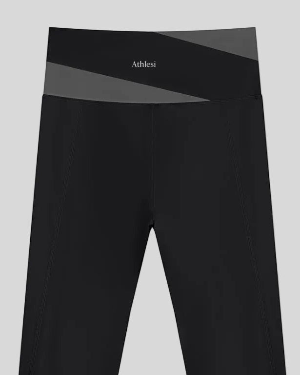 TrackLine Synergy Leggings in Black with Dark Gray color-block waistband, back view logo closeup