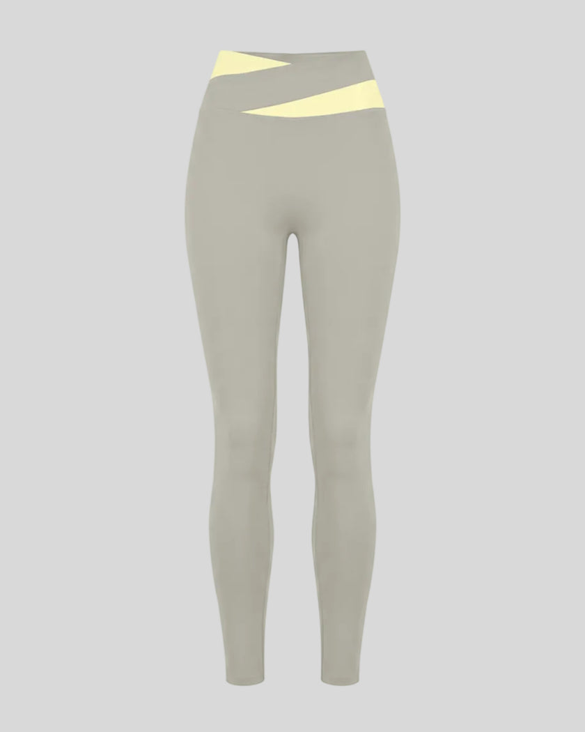 TrackLine Synergy Leggings in Light Gray with Light Yellow crossover waistband, front view