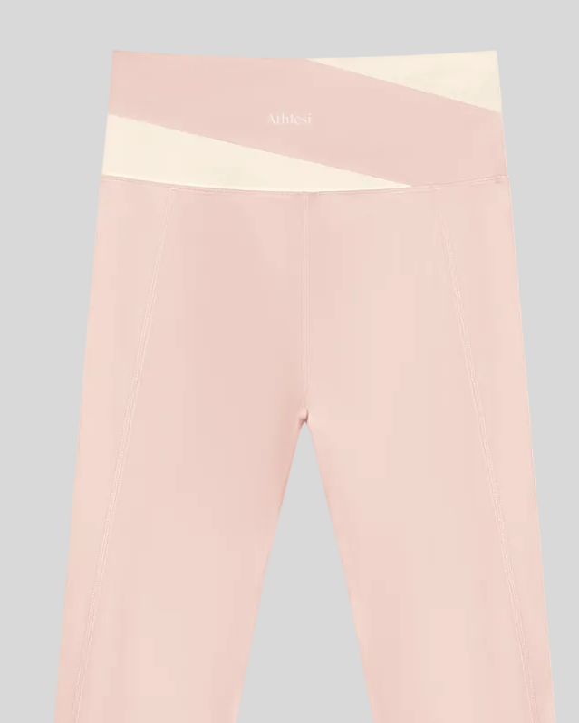 TrackLine Synergy Leggings in Light Pink with Apricot color-block waistband, back view logo closeup