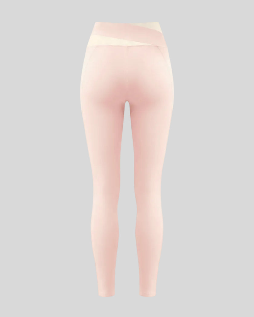 TrackLine Synergy Leggings in Light Pink with Apricot color-block waistband, back view