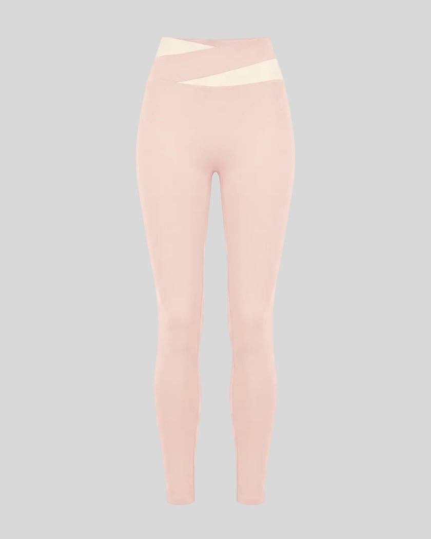 TrackLine Synergy Leggings in Light Pink with Apricot crossover waistband, front view