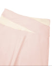 Close-up of color-block back waistband on TrackLine Synergy Leggings in Light Pink and Apricot