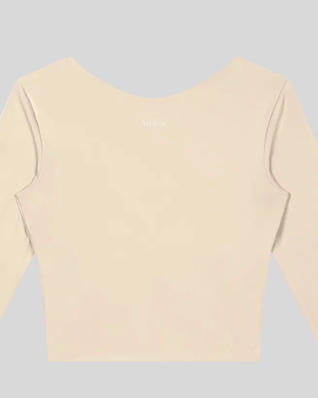 Closeup of Athlesi logo on apricot TrackLine Synergy Long Sleeve Top back