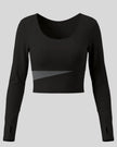 TrackLine Synergy Long Sleeve Top in black with dark gray asymmetric color-block front detail