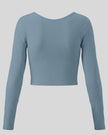 TrackLine Synergy Long Sleeve Top in gray blue with fitted long sleeves and clean back design