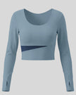 TrackLine Synergy Long Sleeve Top in gray blue with navy blue asymmetric color-block front detail