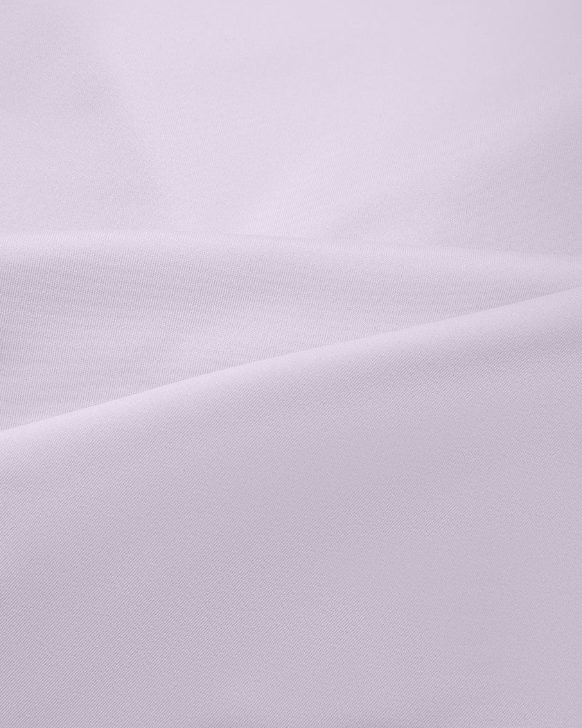 Closeup of stretch knit fabric on TrackLine Synergy Long Sleeve Top in light purple
