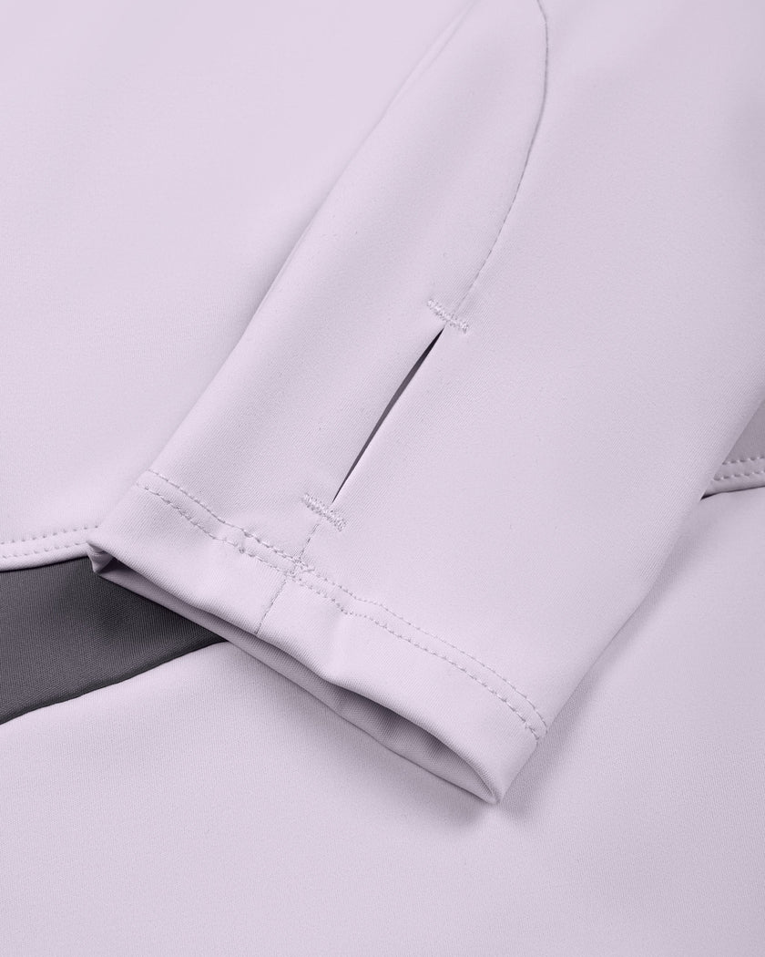 Closeup of thumbhole sleeve cuff on TrackLine Synergy Long Sleeve Top in light purple