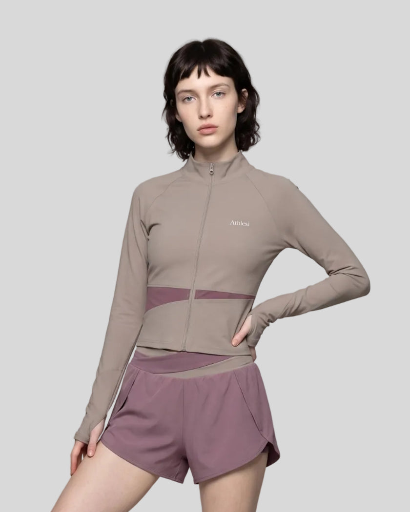 Woman wearing TrackLine Synergy Performance Jacket in Gray Purple with Misty Purple panel, front view