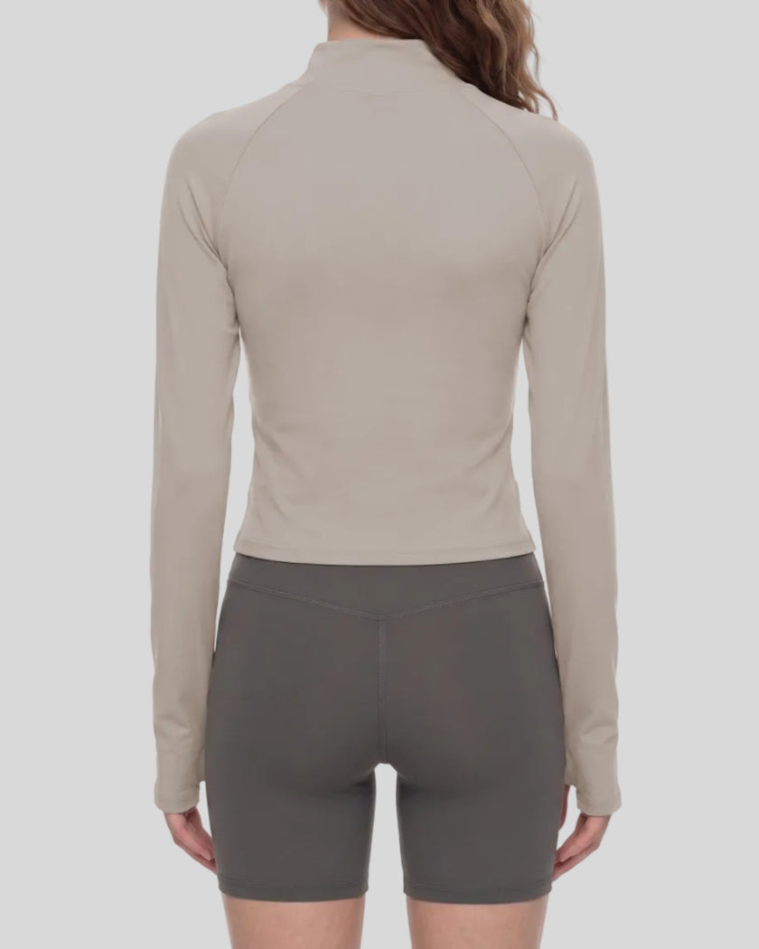 Woman wearing TrackLine Synergy Performance Jacket in Gray Purple with Misty Purple panel, mid body back view