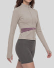 Woman wearing TrackLine Synergy Performance Jacket in Gray Purple with Misty Purple panel, mid body front angle view