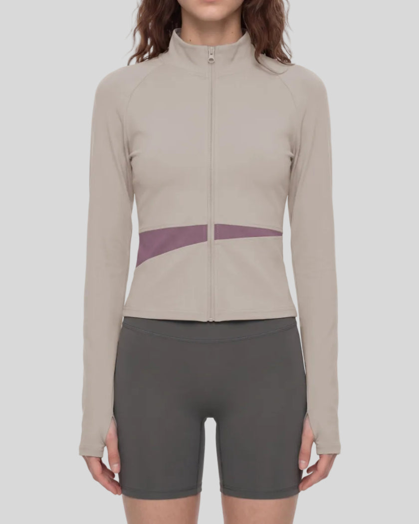 Woman wearing TrackLine Synergy Performance Jacket in Gray Purple with Misty Purple panel, mid body front view