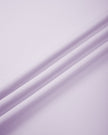 Close-up of smooth stretch fabric on TrackLine Synergy Performance Jacket in Light Purple