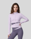 Woman wearing TrackLine Synergy Performance Jacket in Light Purple with Deep Purple panel, front view