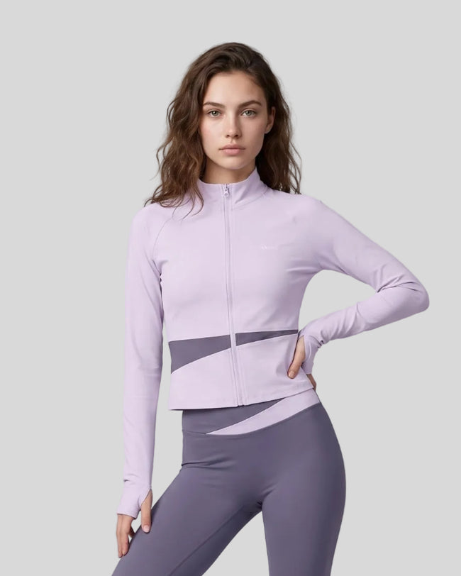 Woman wearing TrackLine Synergy Performance Jacket in Light Purple with Deep Purple panel, front view