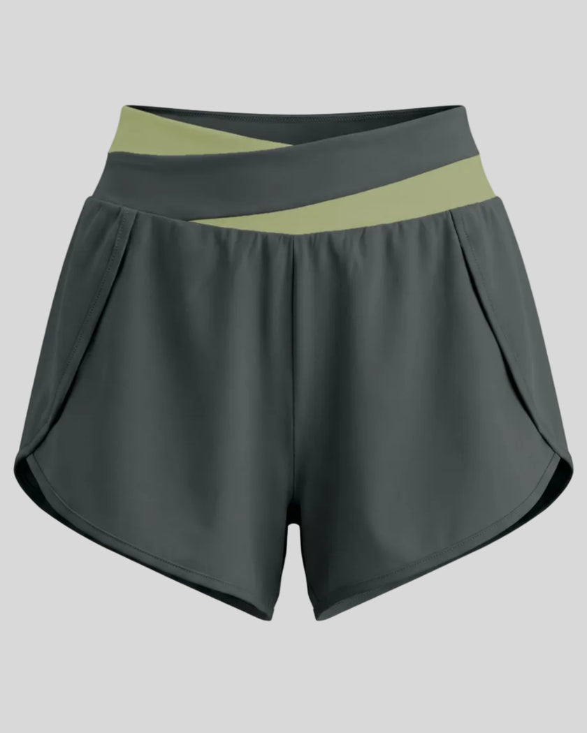 TrackLine Synergy Performance Shorts in Dark Gray with Green Bean color-block waistband, front view