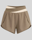 TrackLine Synergy Performance Shorts in Light Coffee with Apricot color-block waistband, front view