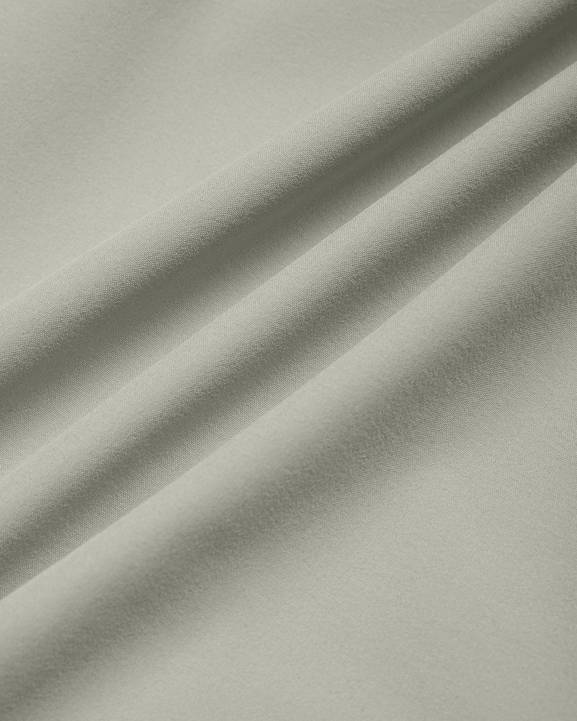 Close-up of lightweight outer fabric on TrackLine Synergy Performance Shorts in Light Gray