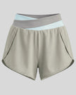 TrackLine Synergy Performance Shorts in Light Gray with Light Blue color-block waistband, front view