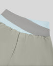 Close-up of color-block back waistband on TrackLine Synergy Performance Shorts in Light Gray and Light Blue