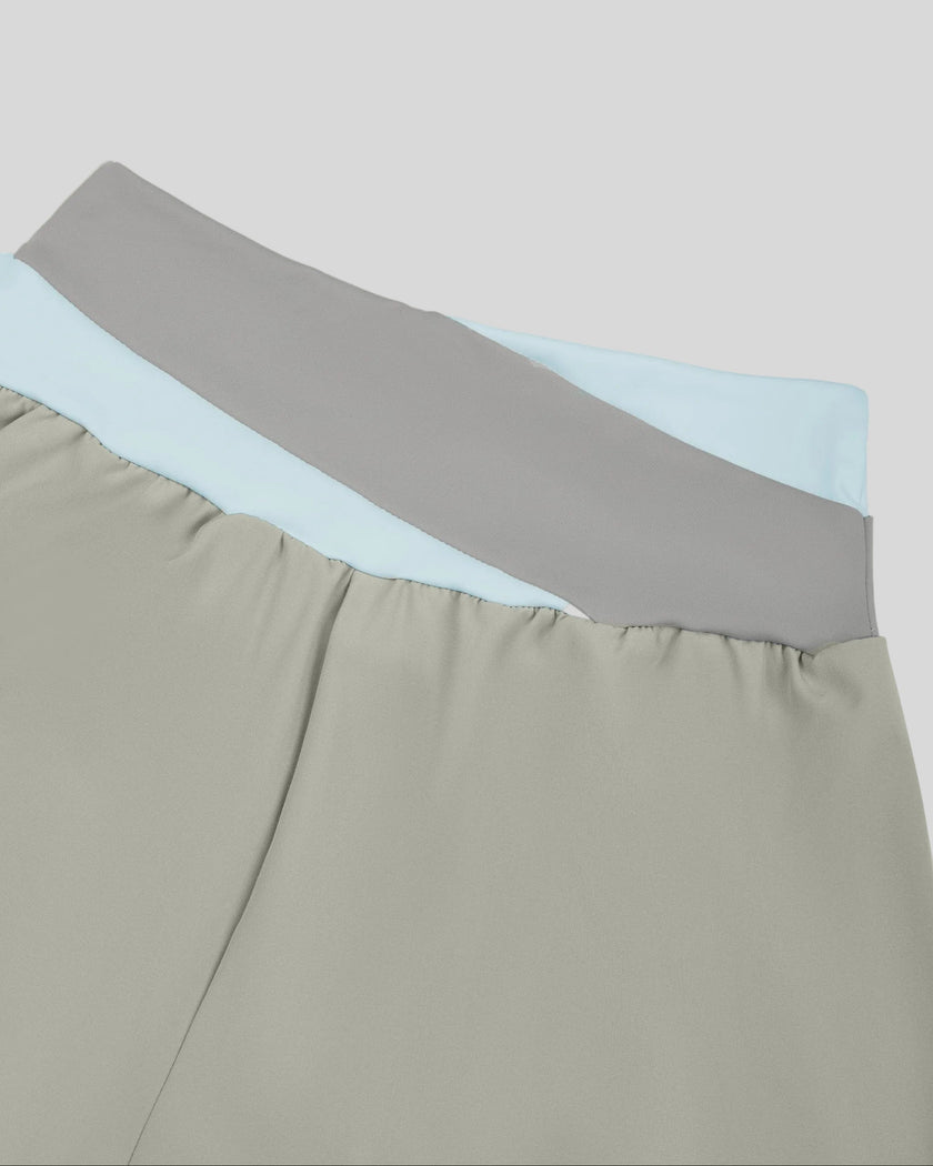 Close-up of color-block back waistband on TrackLine Synergy Performance Shorts in Light Gray and Light Blue