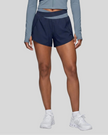 Woman wearing TrackLine Synergy Performance Shorts in Navy Blue with Gray Blue waistband, lower body front view