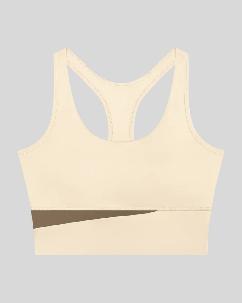 TrackLine Synergy Racerback Sports Bra in Apricot with Khaki color-block detail, front view
