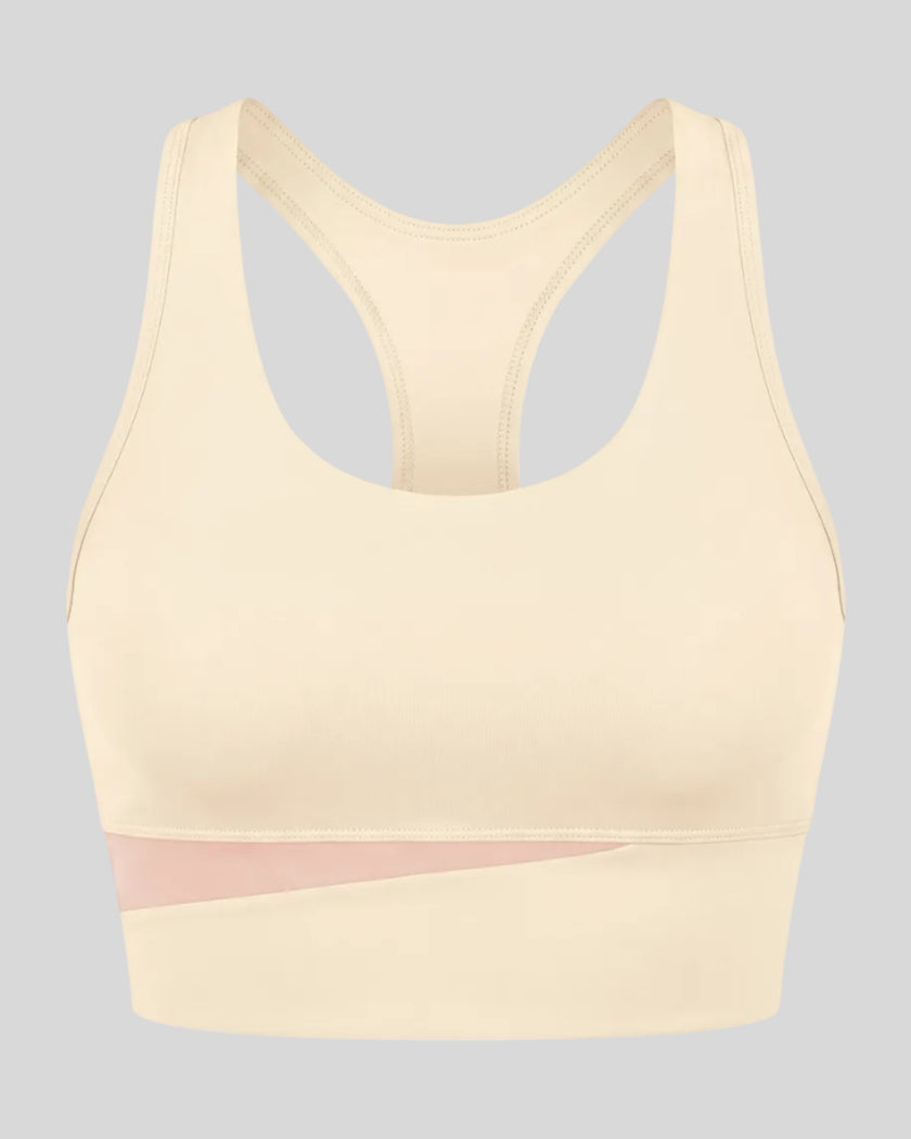 TrackLine Synergy Racerback Sports Bra in Apricot with Light Pink color-block detail, 3d front view
