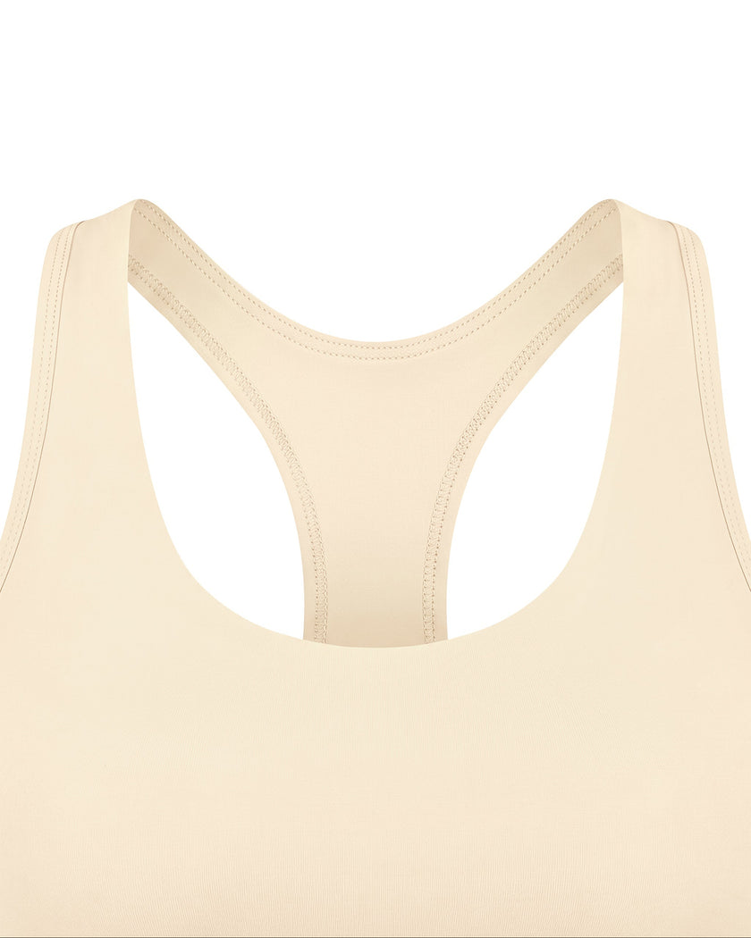 Close-up of U-neckline on TrackLine Synergy Racerback Sports Bra in Apricot