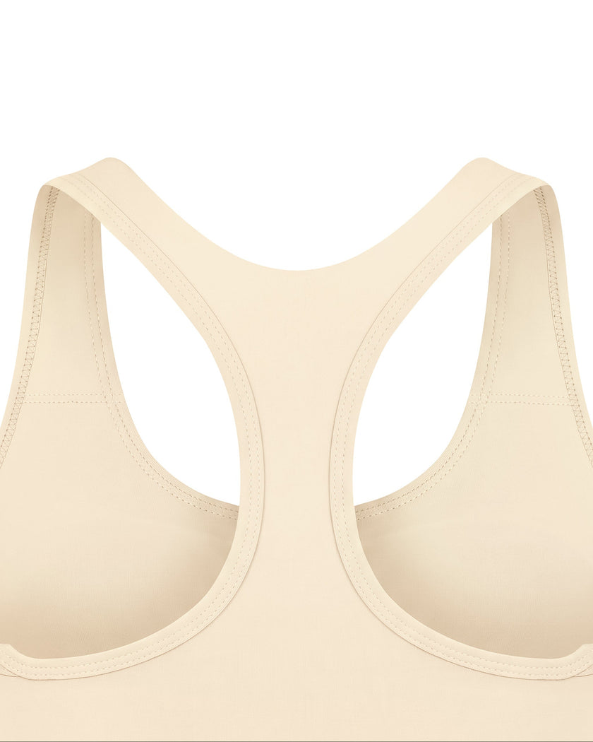 Close-up of racerback design on TrackLine Synergy Racerback Sports Bra in Apricot