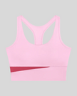 TrackLine Synergy Racerback Sports Bra in Rose Red with Pink color-block detail, front view