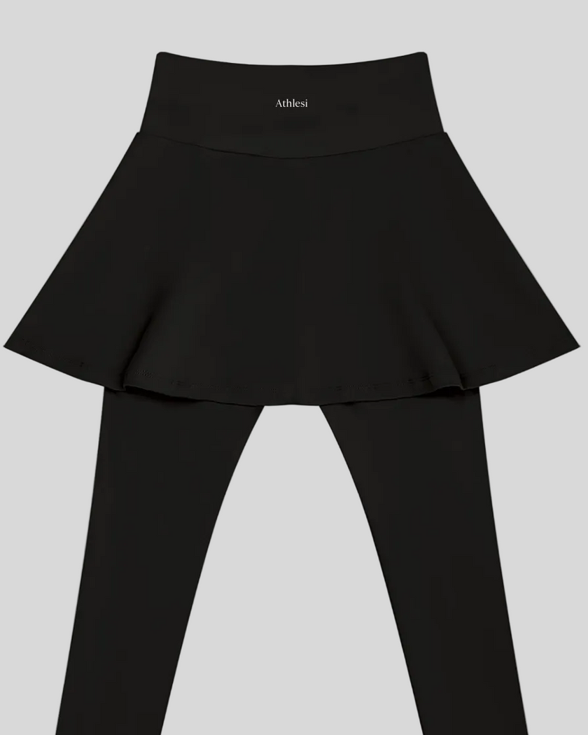 TrackLine Synergy Skirted Leggings in Black with integrated flared skirt and Athlesi logo, back view closeup