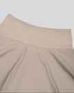 Close-up of high-rise back waistband on TrackLine Synergy Skirted Leggings in Light Coffee