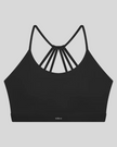TrackLine Synergy Strappy Sports Bra in Black, flat lay front view