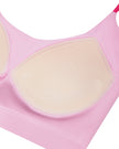 TrackLine Synergy Strappy Sports Bra in Pink with Rose Red, close-up showing built-in chest pads