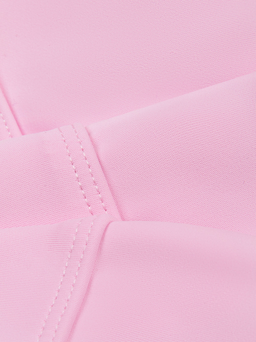 TrackLine Synergy Strappy Sports Bra in Pink with Rose Red, close-up of smooth stretch fabric