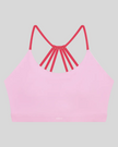 TrackLine Synergy Strappy Sports Bra in Pink with Rose Red, flat lay front view